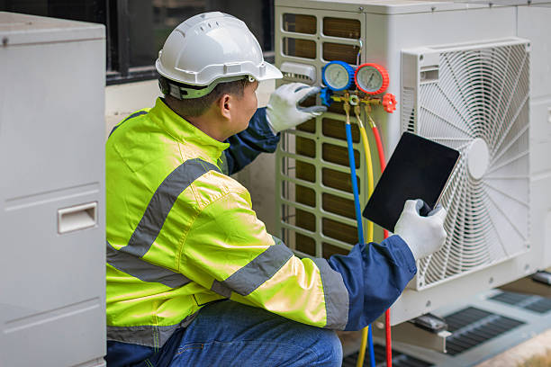 Professional Air Duct Cleaning technician working in Thompson, ND